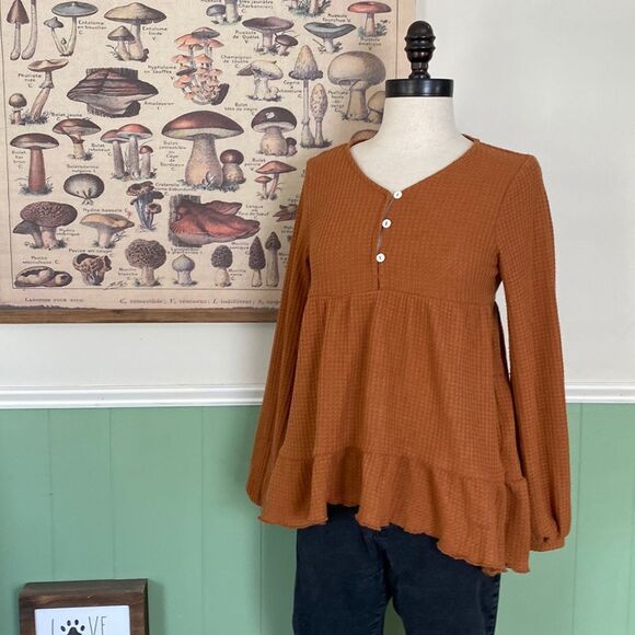 Burnt Orange Ribbed Peplum Top - Picture 1 of 5